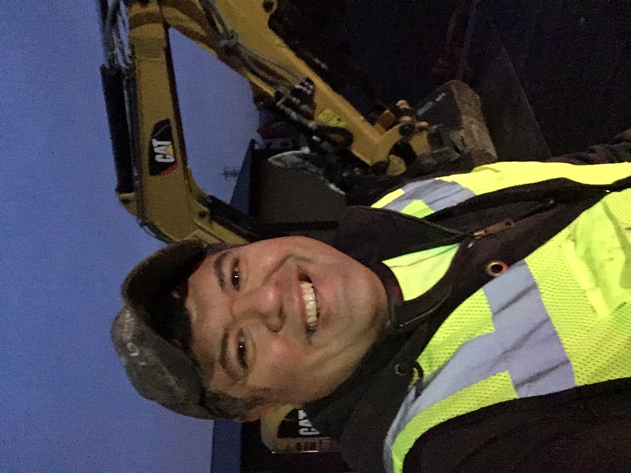 David Molina onsite with CAT mini excavator